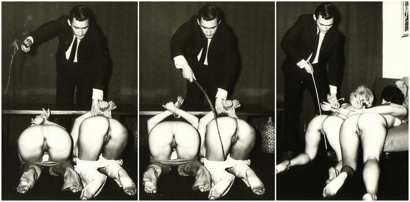 two women stripped and tied and whipped and caned by a stern man in a suit and tie